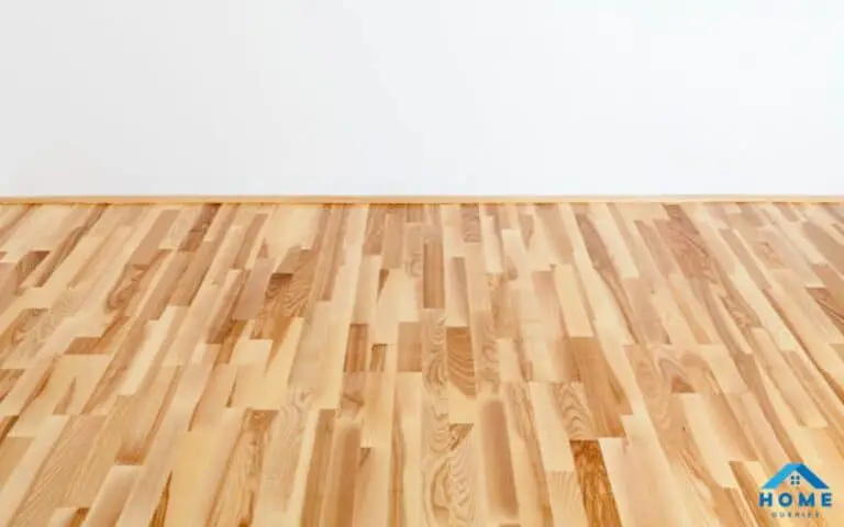 Laminate floor buckling? Find out why and how to fix it.