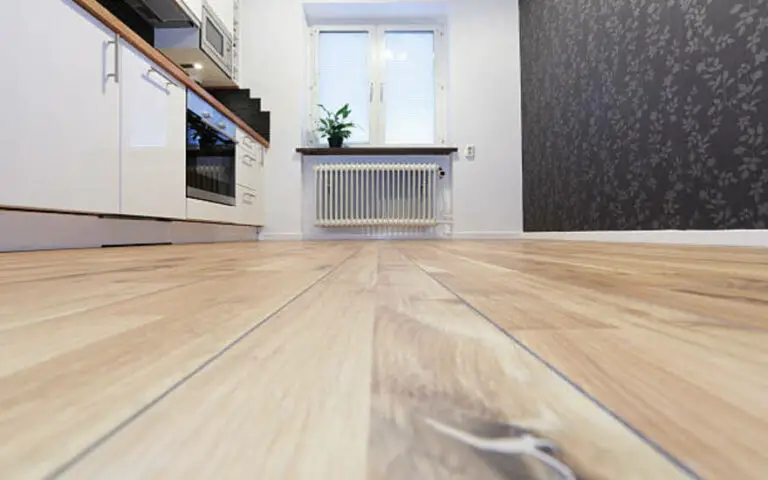 Which is better for a kitchen floor laminate or vinyl?